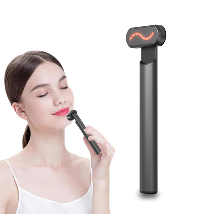 Velou Ray red light facial wand in use along the jawline with device detail view