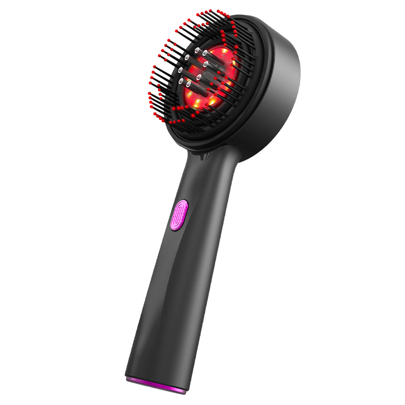 Velou Grow black scalp massage comb with red LED array illuminated